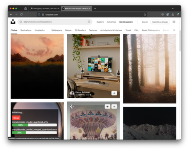 Model download progress as an injected overlay on the Unsplash homepage.